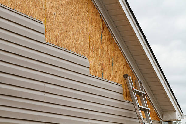 Professional Siding Contractor technician working in Laurel, MD